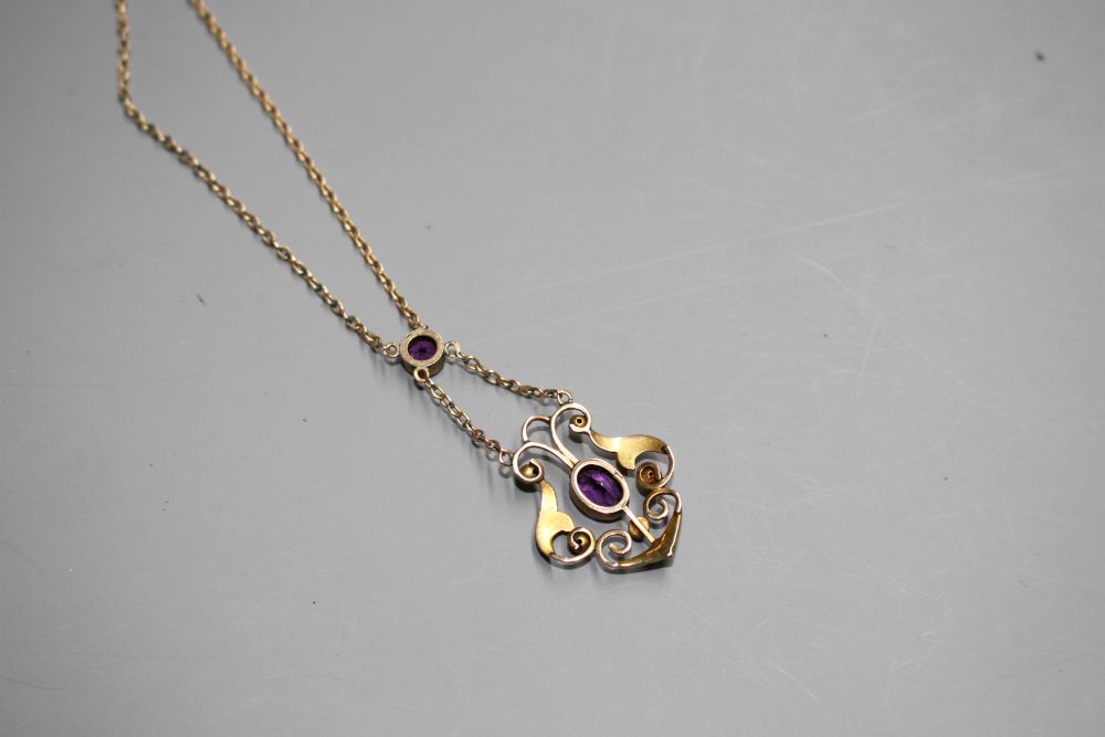 An Edwardian 9ct, amethyst and seed pearl set pendant necklace,